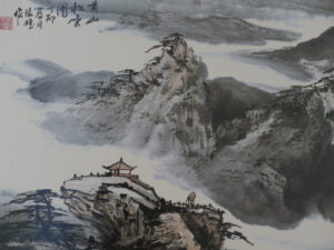 Chinesische Gebirgslandschaft, als Tusche-Malerei ausgeführt.